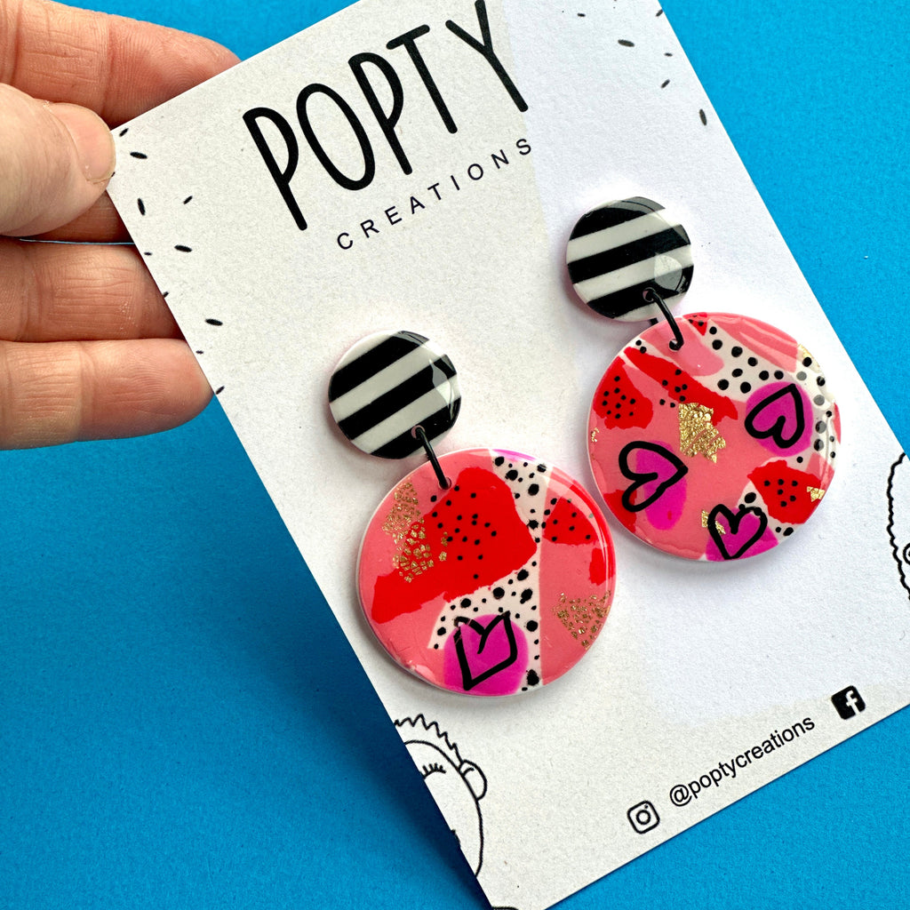 SECRET LOVERS LARGE CIRCLE DANGLES